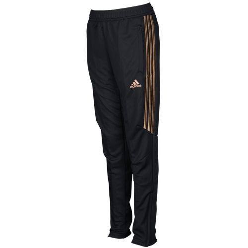 black and gold tiro pants