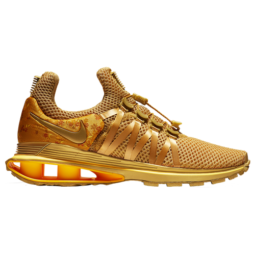 nike shox gravity women's gold